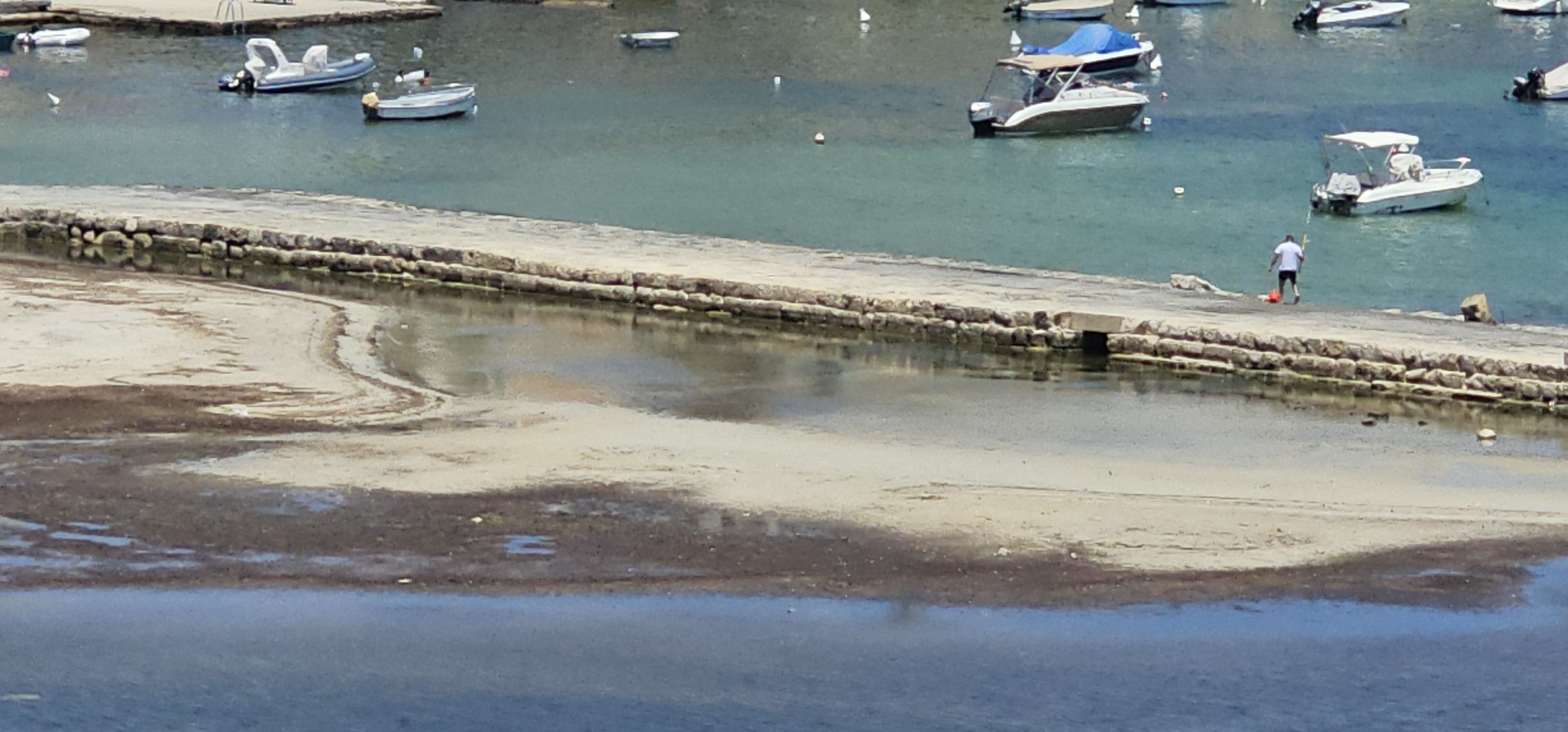 Lone fisherman scares of the seabirds at Salina Nature Reserve
